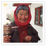 Old  Womem with  Prayer Wheel